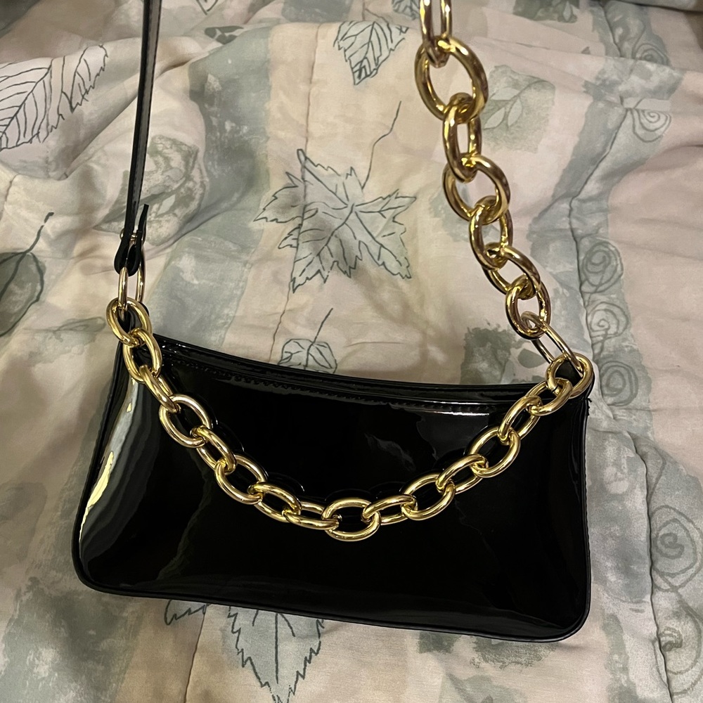 pleather black purse with gold chains